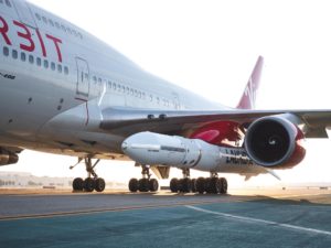 The LauncherOne pod mounted to VirginOrbit's Cosmic Girl.