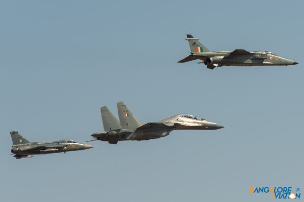 The missing man formation, flown by three aircraft of the Indian Air Force - a HAL Tejas, Sukhoi Su-30 MKI and Sepecat Jaguar. Observe the gap between the Sukhoi and Jaguar signifying the missing pilot.