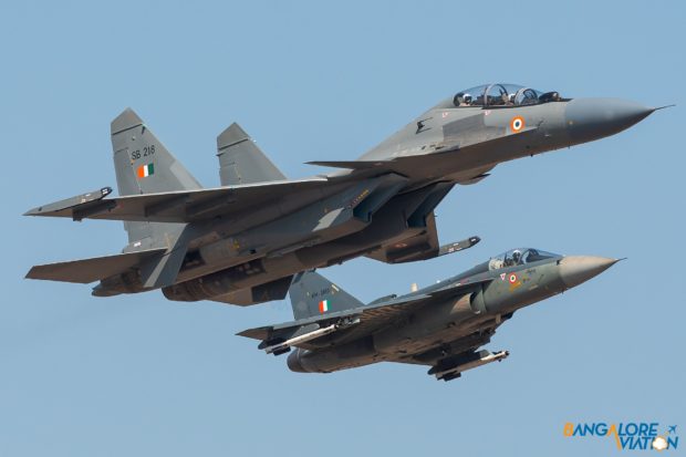 Sukhoi Su-30 MKI flying with the HAL Tejas (LCA) at Aero India 2019.