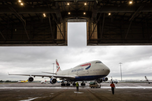 British Airways Boeing 747 G-BYGC goes into a paint bay at Dublin Airport.