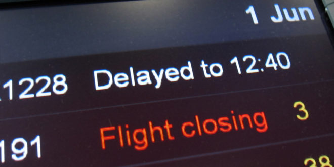 Delayed flights information board.